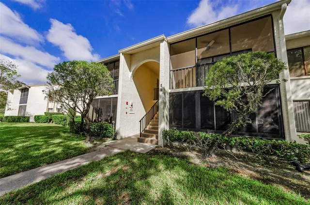 a view of a glass door and an outdoor space