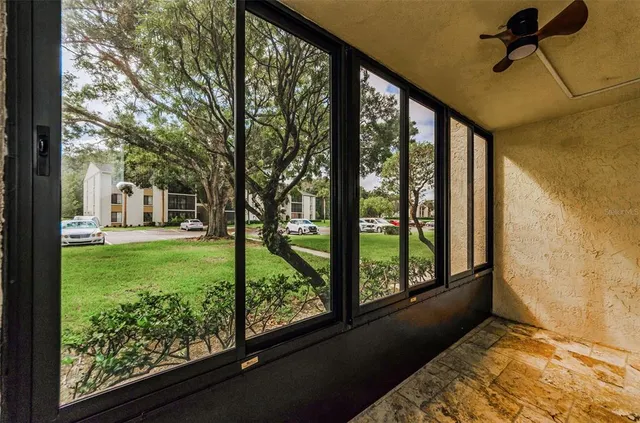 an aerial view of a house with a lake view