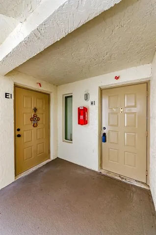 an aerial view of a house with swimming pool