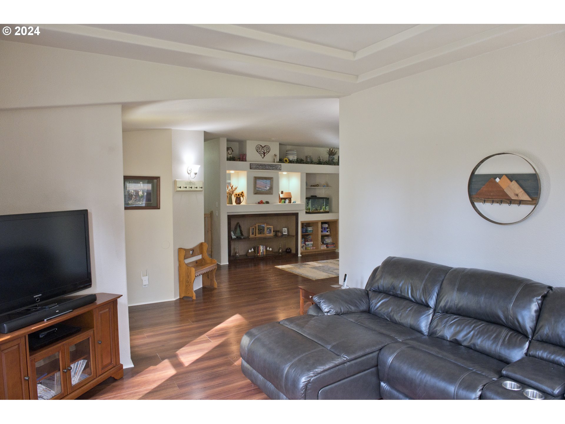 110-81 Rawlins Road Winlock, WA 98596 - Photo 6 of 32 a living room with furniture and a flat screen tv