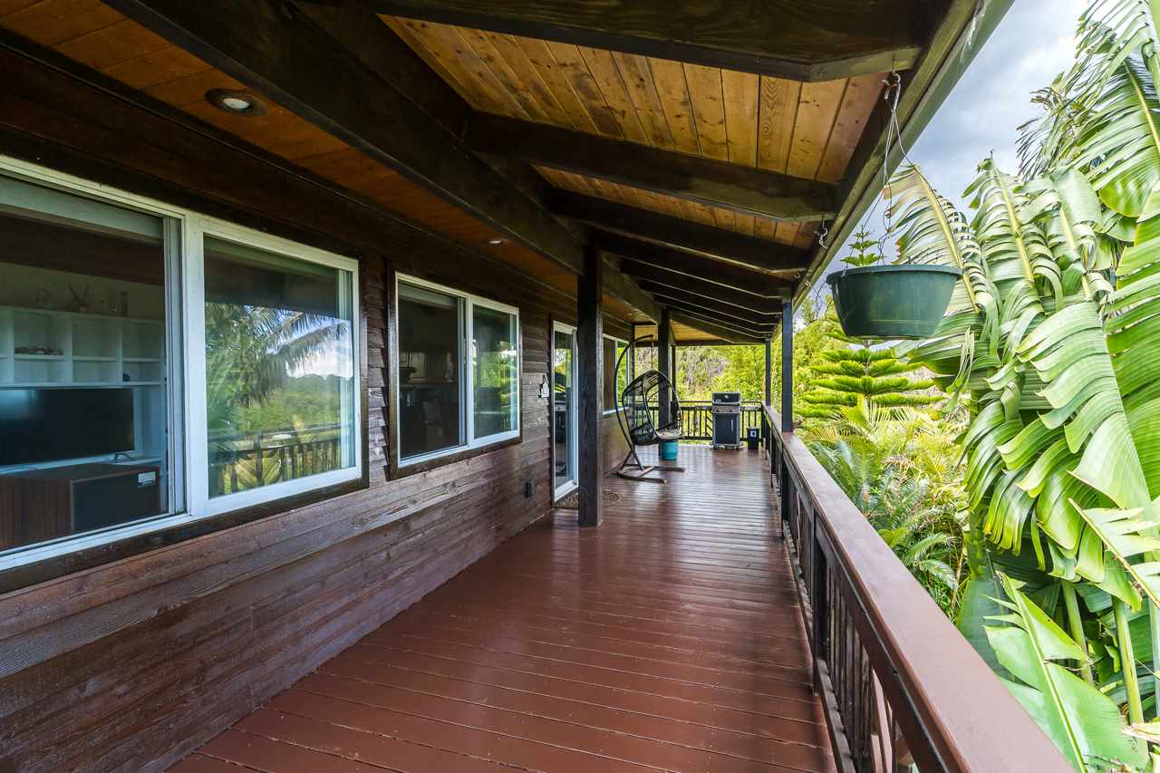 748 Awalau Road, Unit A Haiku, HI 96708 - Photo 28 of 30 a view of a porch with wooden floor and outdoor space