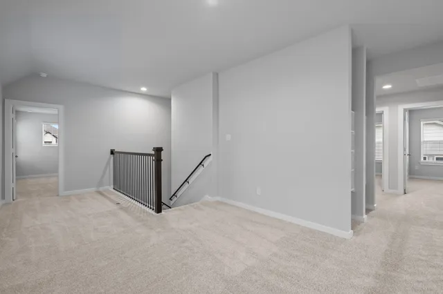 an empty room with closet area