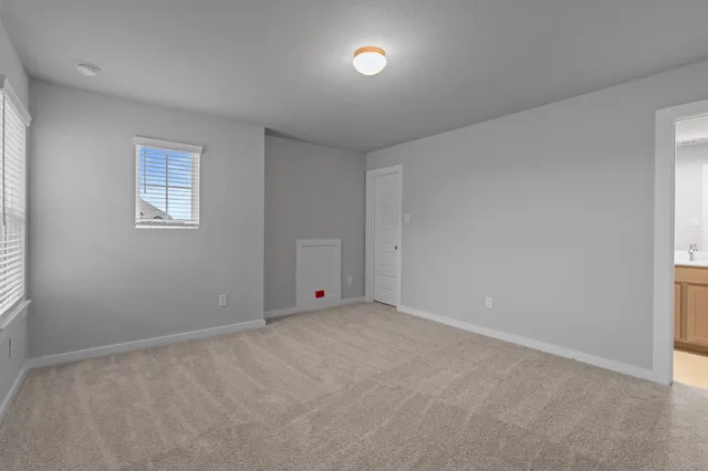 a bathroom with a double vanity sink and mirror