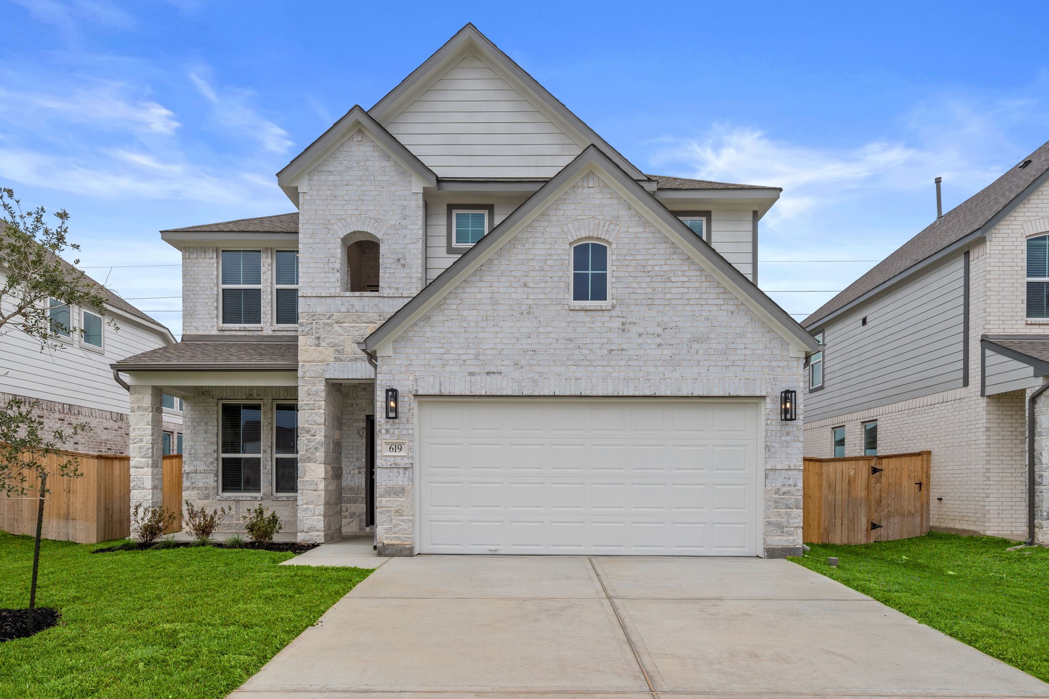619 Yard Master Trail Rosharon, TX 77583 - Photo 36 of 46 a front view of a house with a yard
