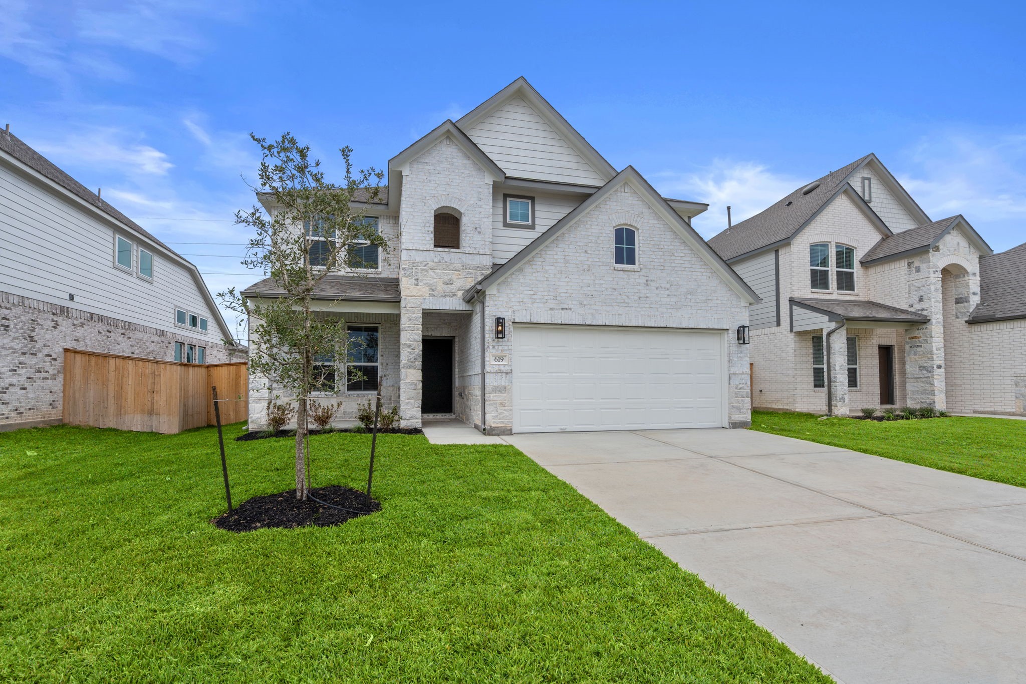 619 Yard Master Trail Rosharon, TX 77583 - Photo 38 of 46 a view of a house with a yard and a porch