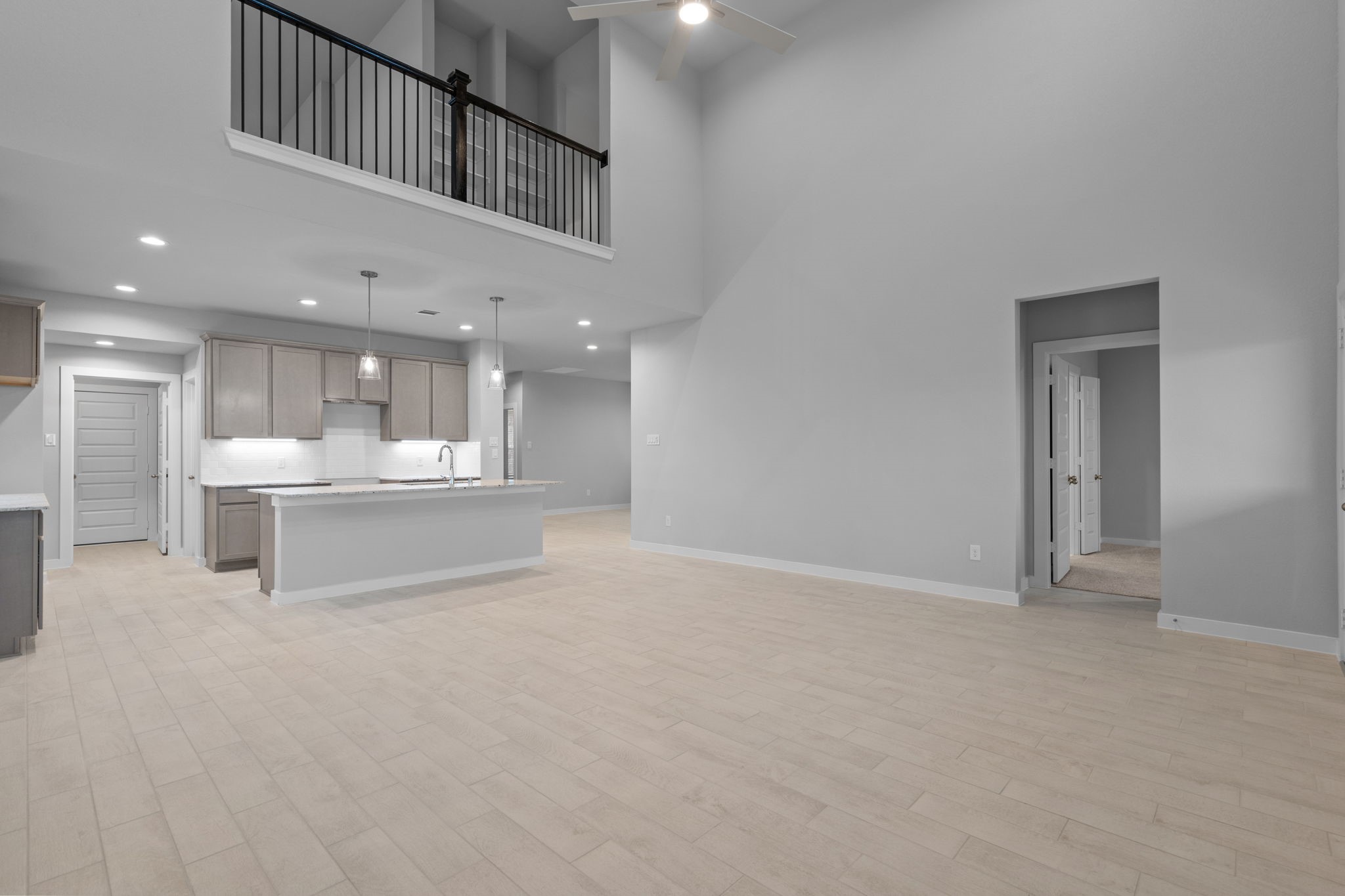 619 Yard Master Trail Rosharon, TX 77583 - Photo 8 of 46 a view of an empty room with kitchen