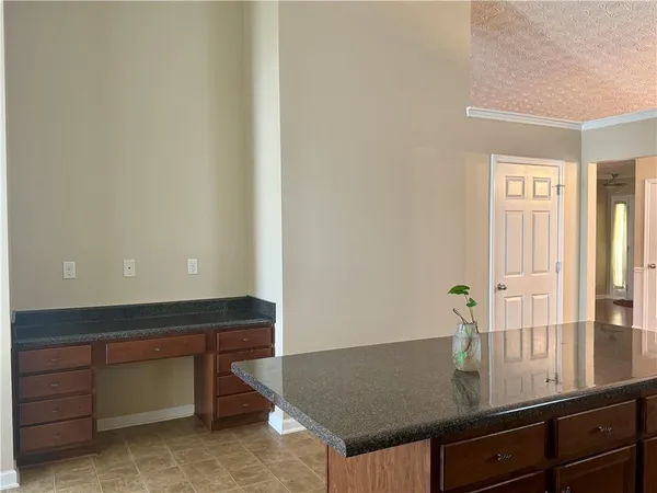 a room with a table and a window