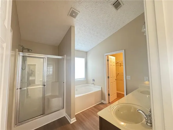 a bathroom with a sink and a bathtub