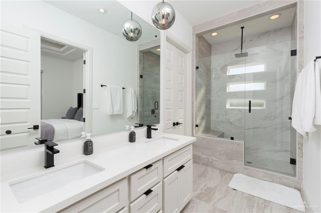 1505 Mount Street Mission, TX 78572 - Photo 23 of 25 Bathroom with an enclosed shower and vanity