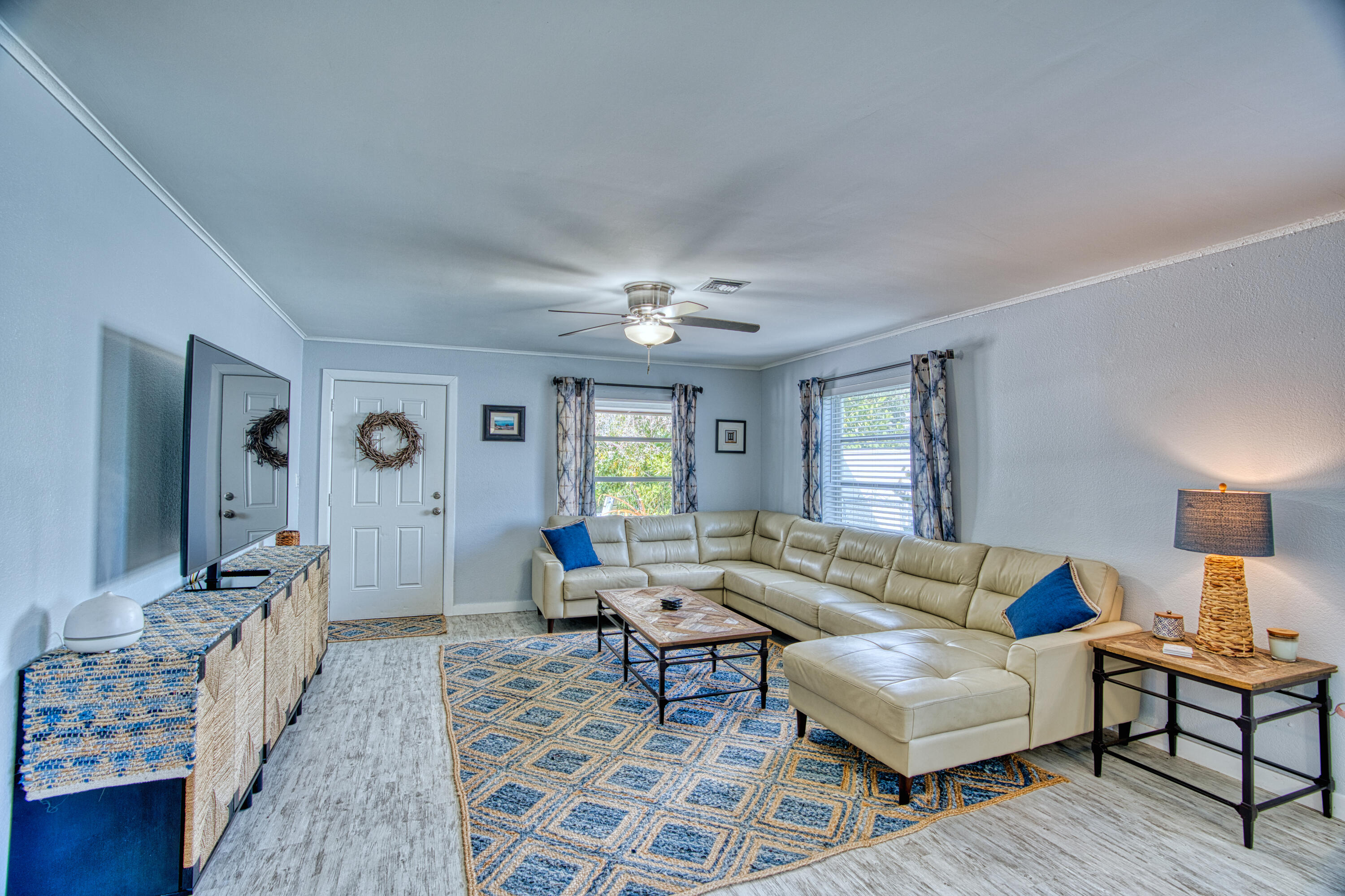 136 1st Road Key Largo, FL 33037 - Photo 18 of 45 a living room with furniture and wooden floor