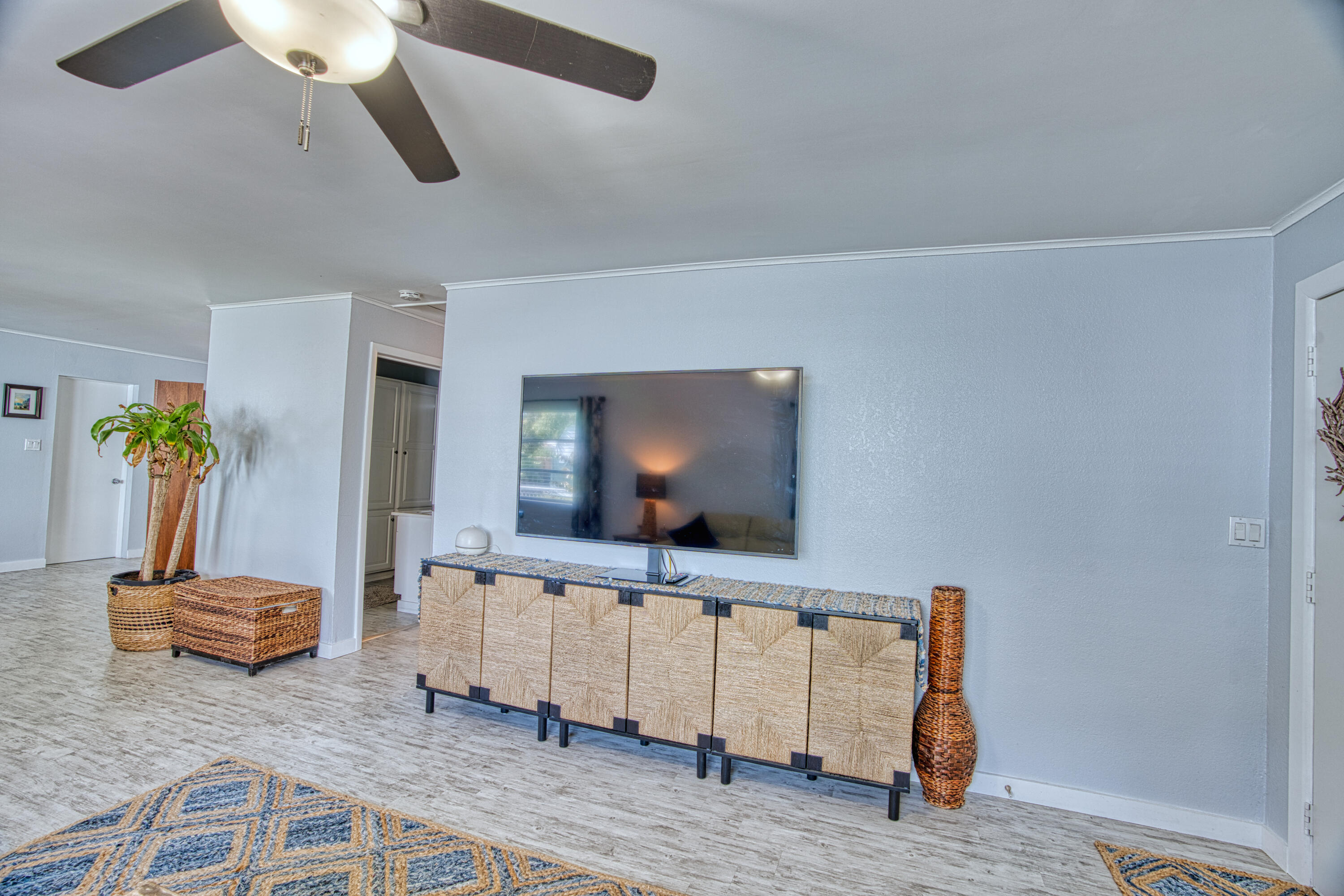 136 1st Road Key Largo, FL 33037 - Photo 20 of 45 a living room with furniture and a flat screen tv
