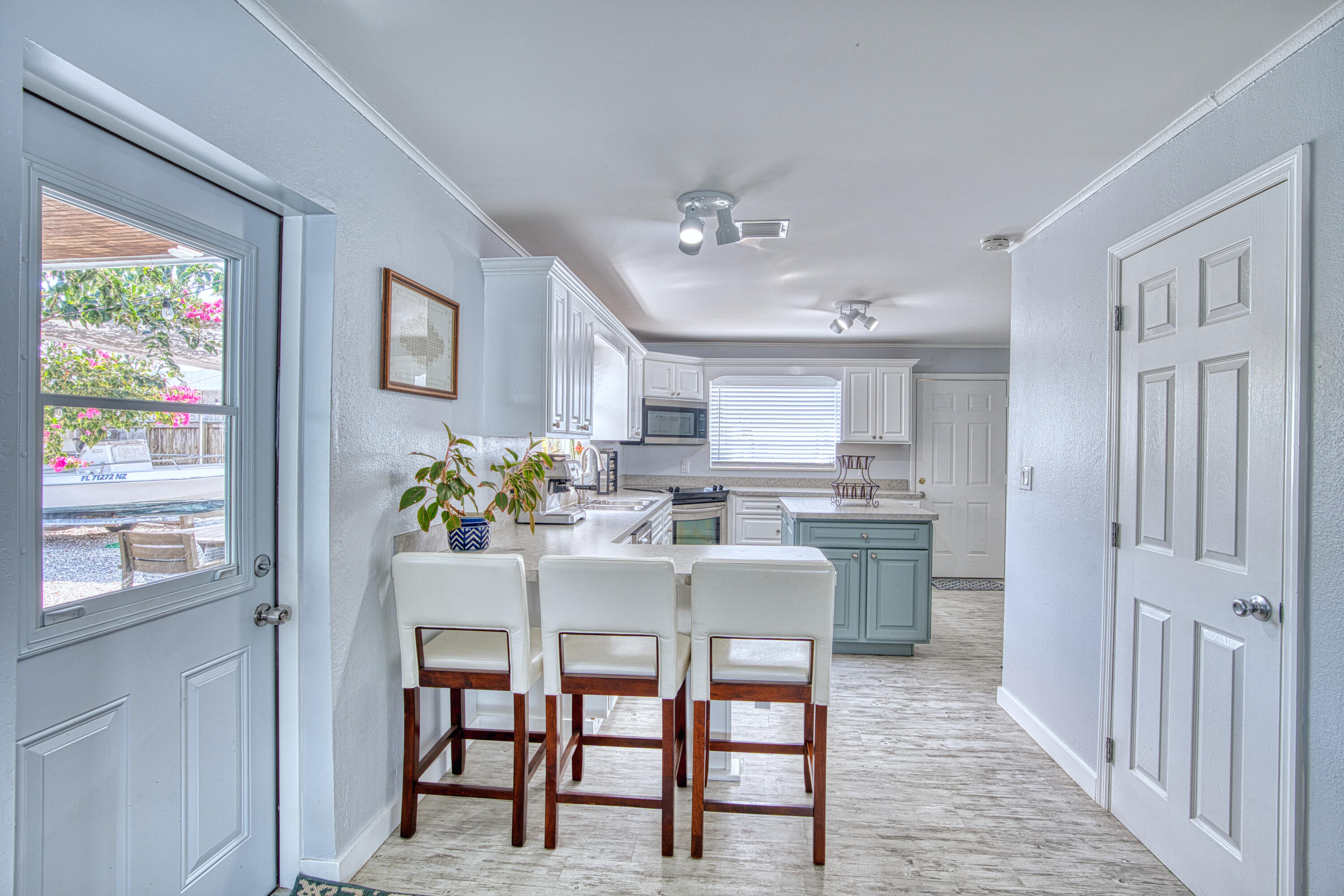 136 1st Road Key Largo, FL 33037 - Photo 23 of 45 a view of a dining room with furniture