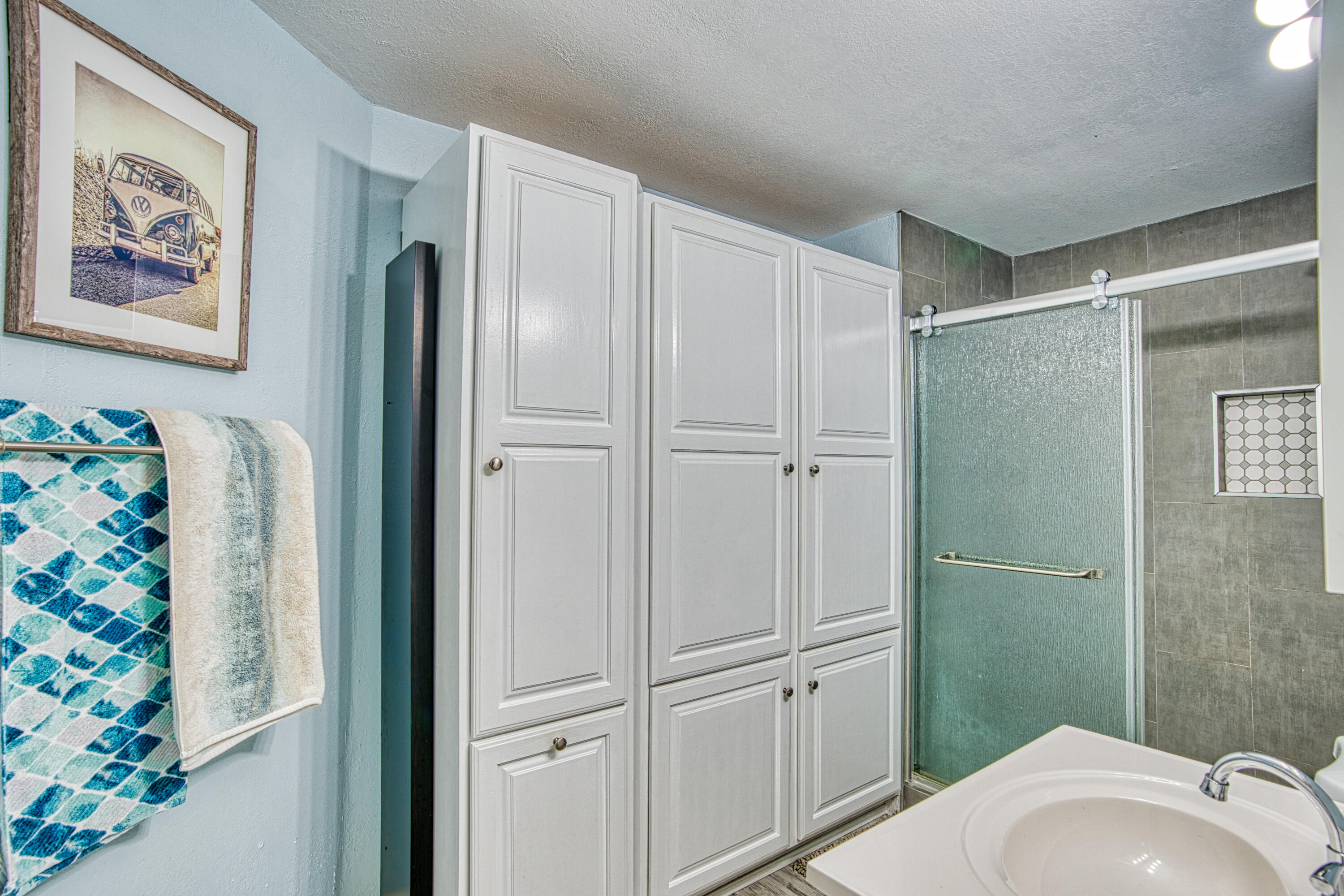 136 1st Road Key Largo, FL 33037 - Photo 37 of 45 a bathroom with a shower and a sink