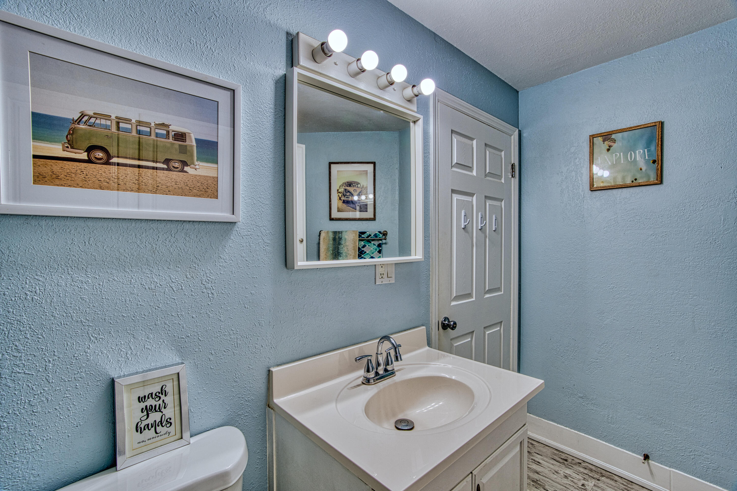 136 1st Road Key Largo, FL 33037 - Photo 40 of 45 a bathroom with a sink a mirror and a toilet