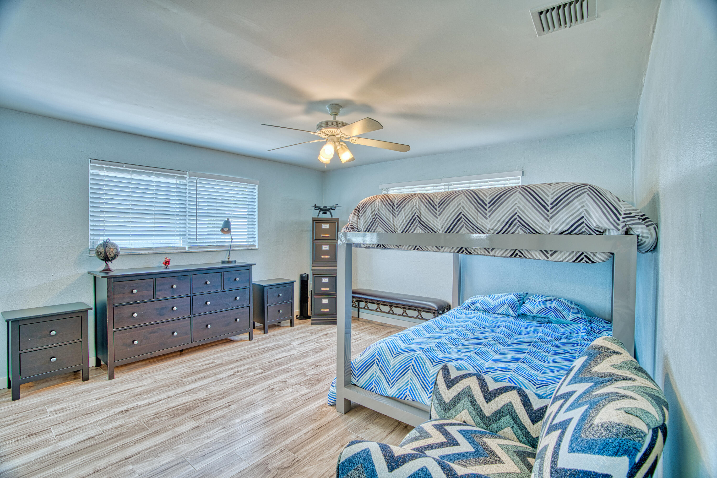 136 1st Road Key Largo, FL 33037 - Photo 41 of 45 a bedroom with a bed and a dresser