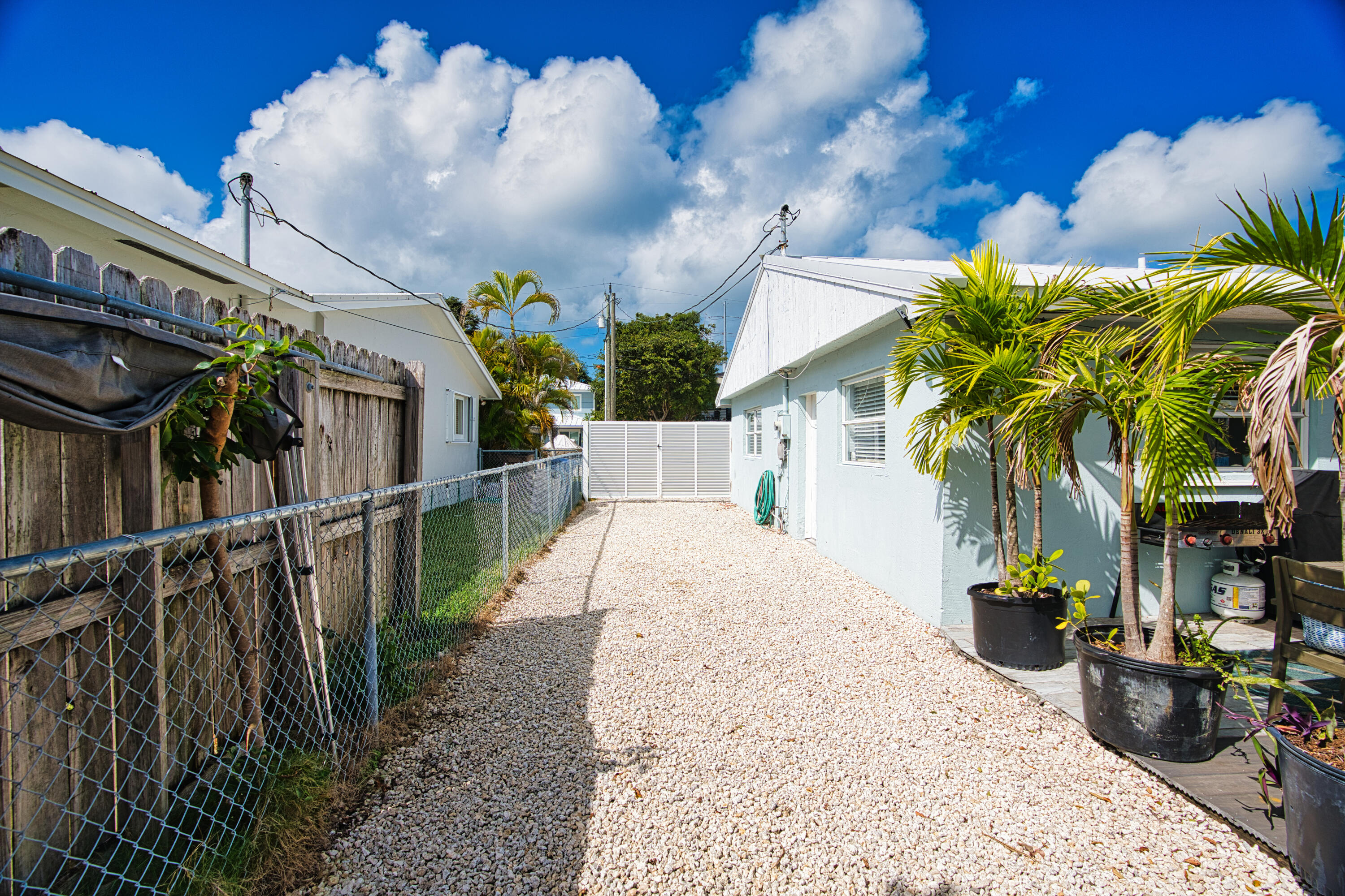 136 1st Road Key Largo, FL 33037 - Photo 9 of 45 a view of a house with a potted plant