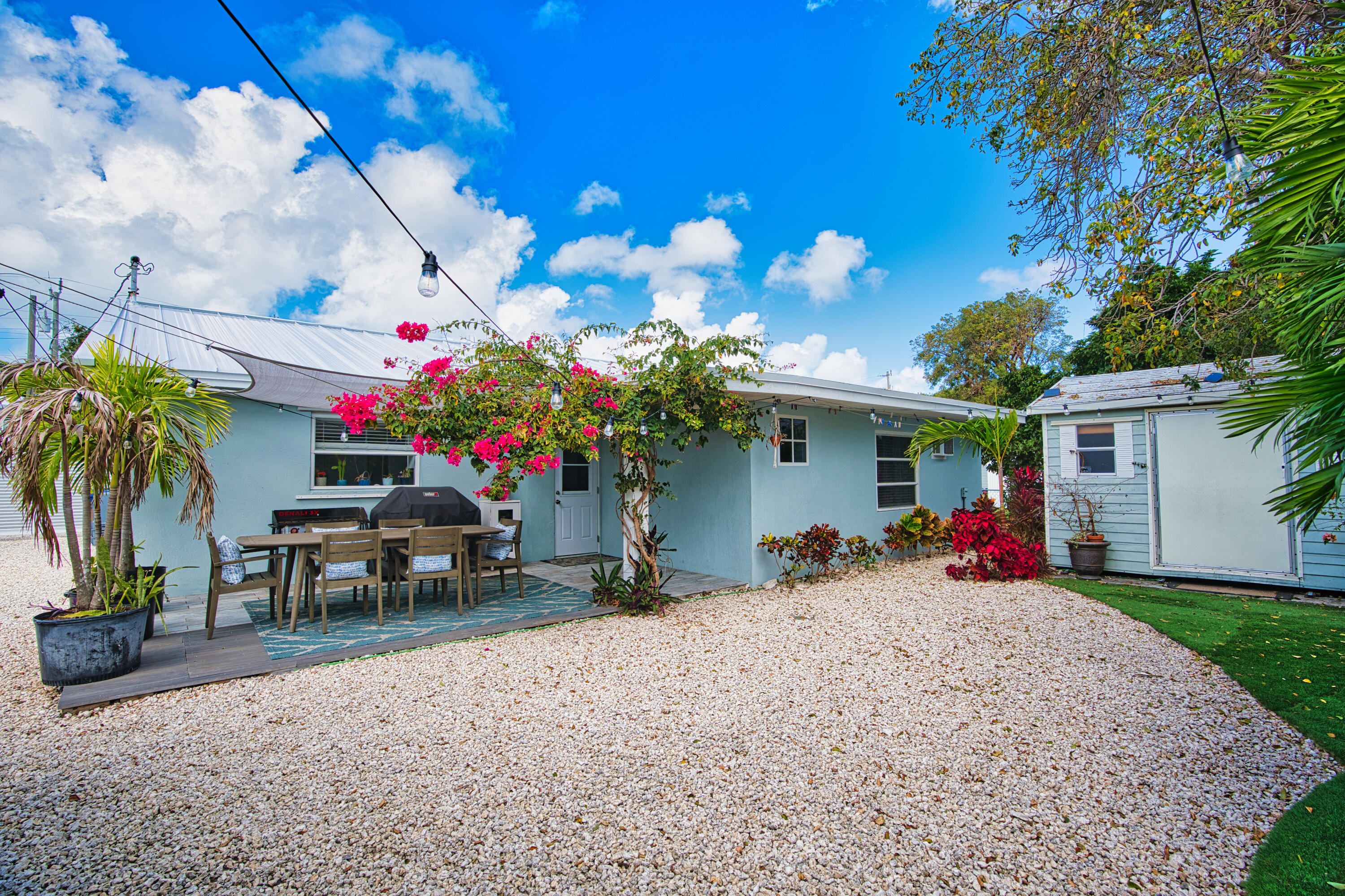 136 1st Road Key Largo, FL 33037 - Photo 10 of 45 a view of a house with sitting area and entertaining space