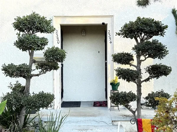 a backyard of a house with seating space