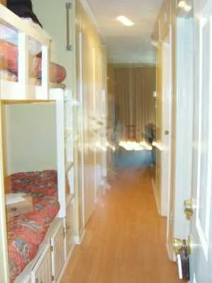 a bathroom with a sink toilet and mirror