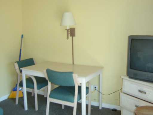 3938 Surfside, Unit 2126 Corpus Christi, TX 78402 - Photo 5 of 7 a view of a dining room with furniture and wooden floor