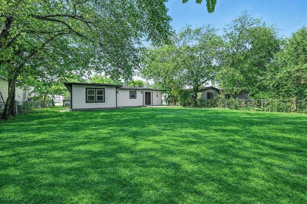 4413 Quails Lane Fort Worth, TX 76119 - Photo 6 of 20 a view of a house with a backyard