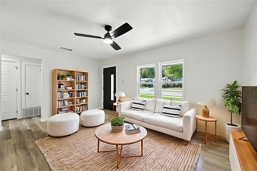 4413 Quails Lane Fort Worth, TX 76119 - Photo 7 of 20 a living room with furniture and a rug