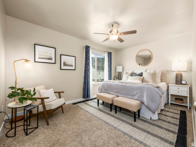 834 West 1050th Street South Springville, UT 84663 - Photo 12 of 26 Carpeted room with a ceiling fan, a window, and light-toned walls