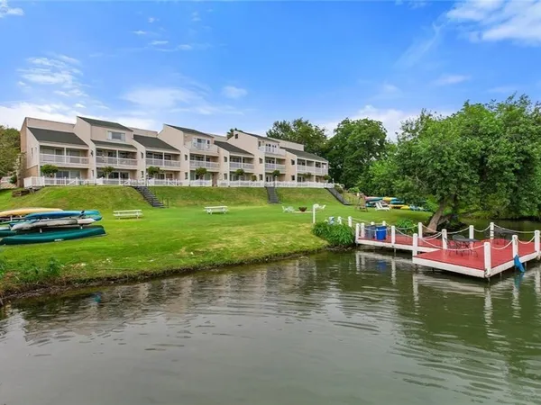 a view of a swimming pool with sitting area