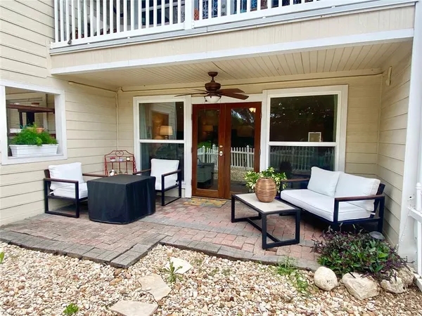 a bedroom with a bed and a book shelf