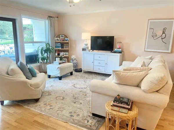 a bathroom with a granite countertop sink a mirror and vanity
