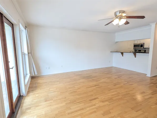 a view of a room with a flat screen tv