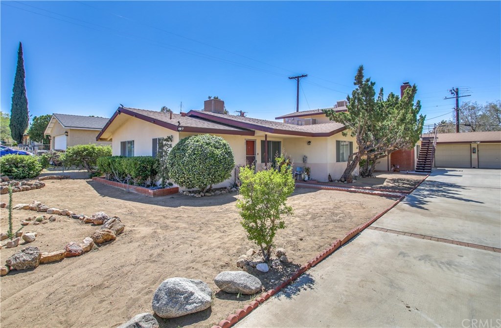 The property is well landscaped with low maintenance plants.