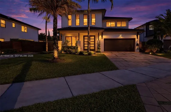 a front view of a house having yard