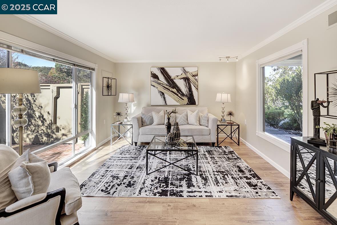 2424 Tice Creek Drive, Unit 2 Walnut Creek, CA 94595 - Photo 3 of 54 a living room with furniture and a large window