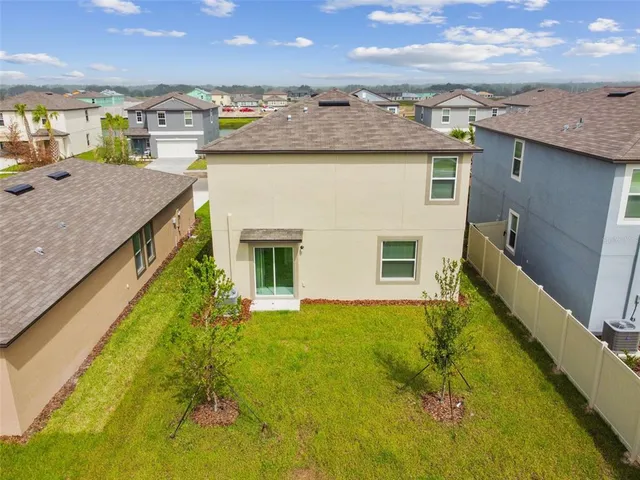 a view of a house with a swimming pool
