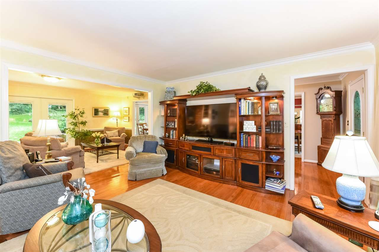 9716 Rock Creek Road Raleigh, NC 27613 - Photo 5 of 25 Living Room looking at Foyer and Family Room