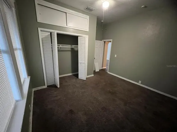 an empty room with windows