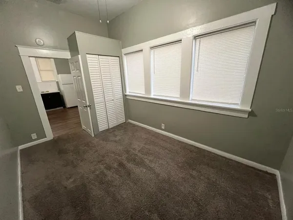 an empty room with closet