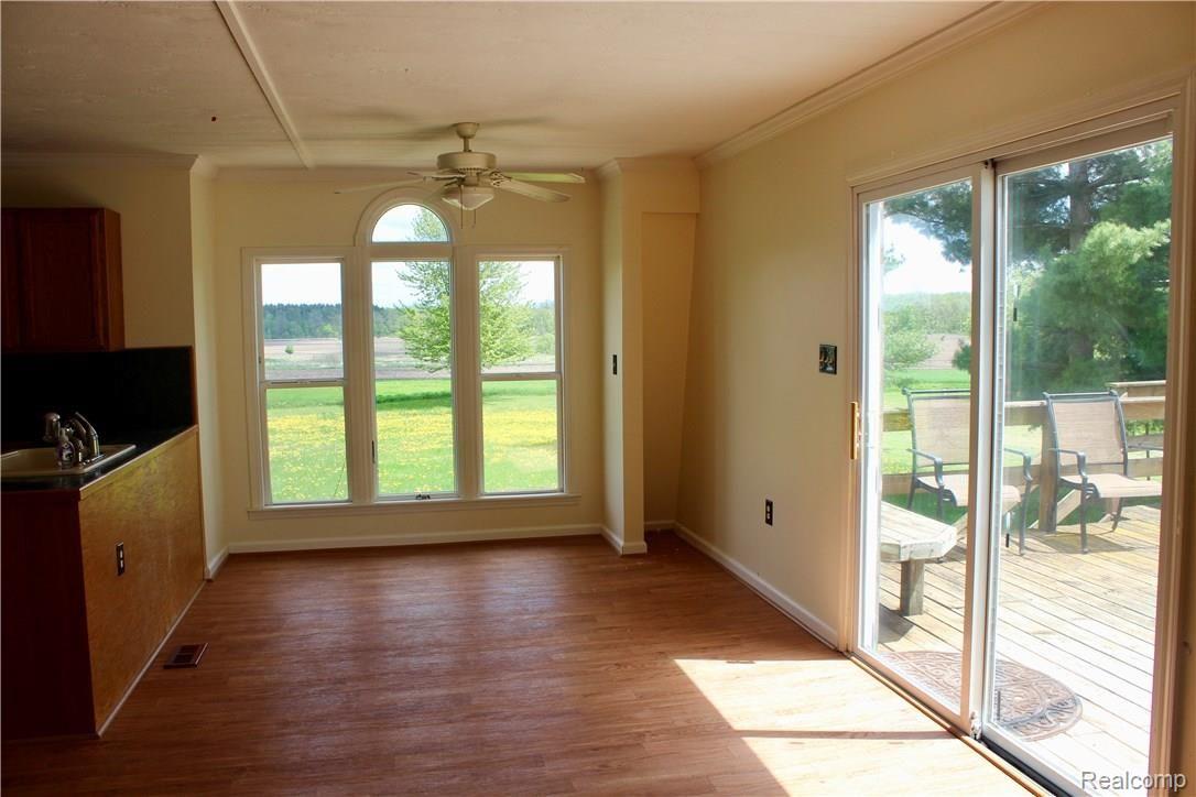 13201 South New Lothrop Road Byron, MI 48418 - Photo 5 of 32 Dining area with view of the back yard