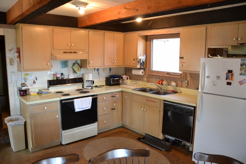 438 County Road Oak Bluffs, MA 02557 - Photo 2 of 12 exposed beams in main level kitchen