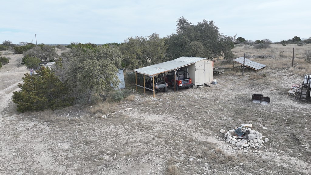 Lot 11 Other Rocksprings, TX 78880 - Photo 3 of 10 an aerial view of a house with a yard