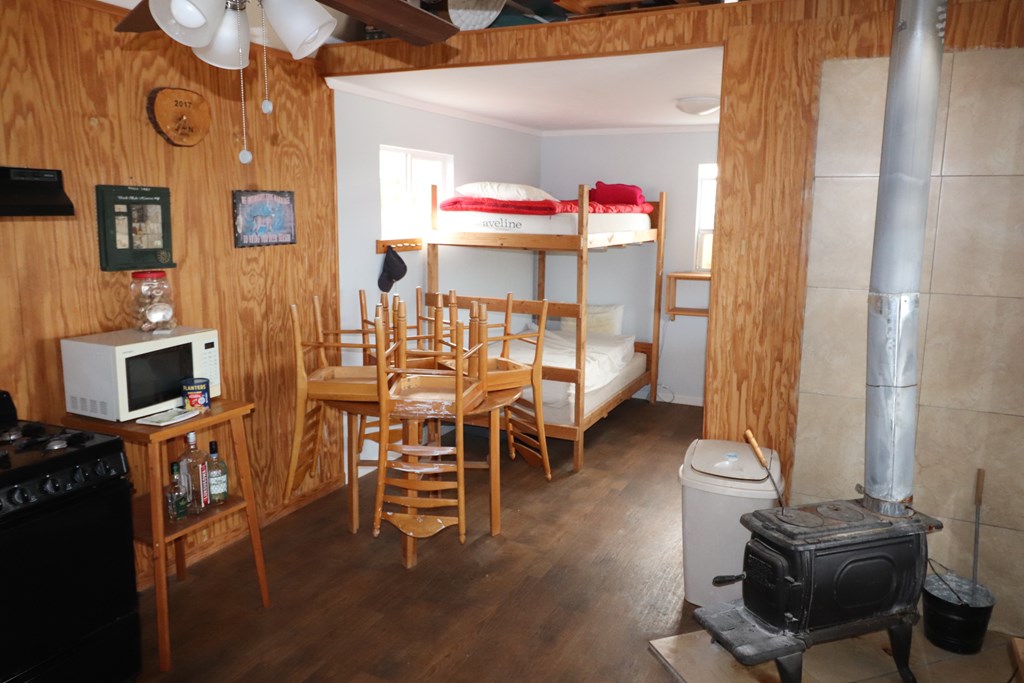 Lot 11 Other Rocksprings, TX 78880 - Photo 10 of 10 a view of a dining room with furniture and a chandelier