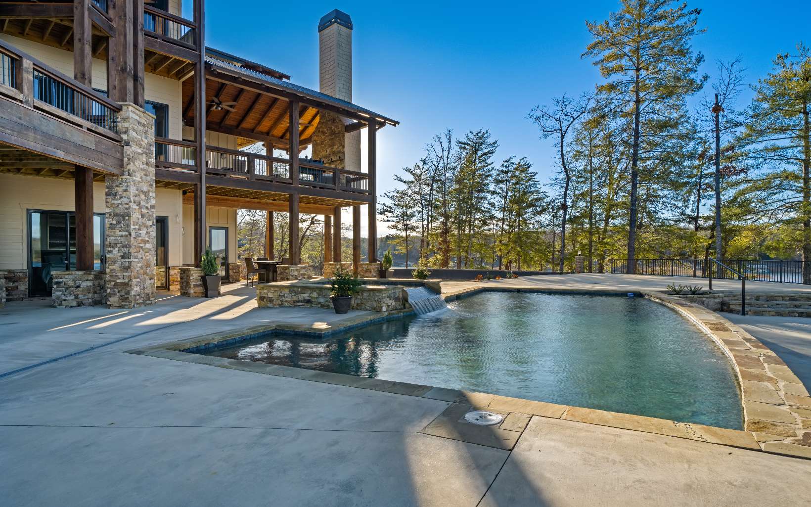 1209 Eaton Road Blue Ridge, GA 30513 - Photo 62 of 75 a view of a swimming pool with a lounge chairs