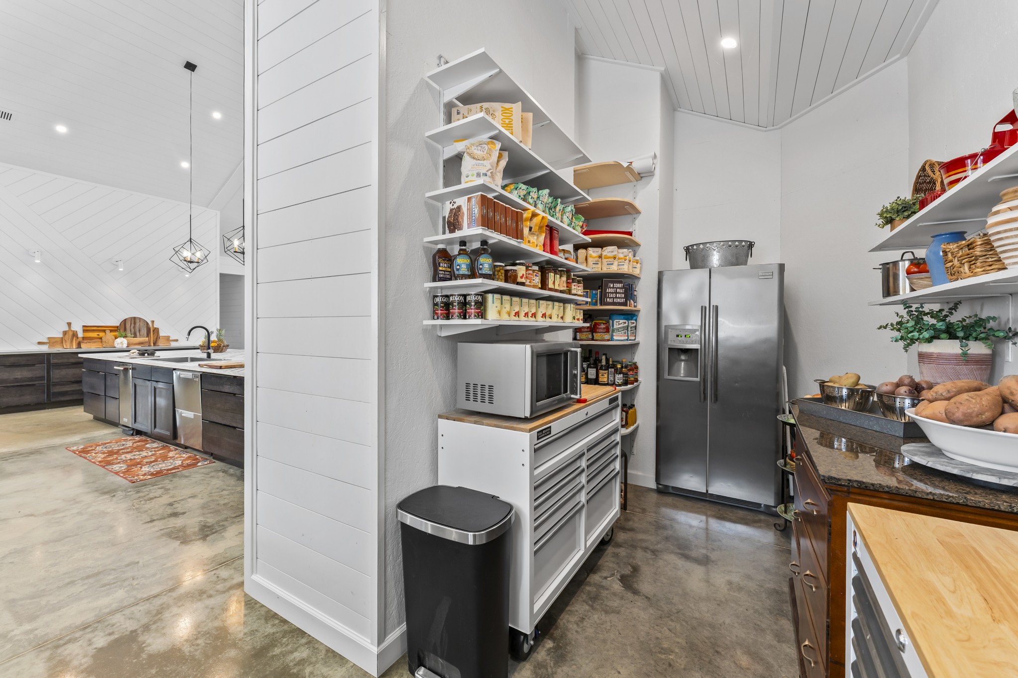 105 Mc Kinney Road Gordonsville, TN 38563 - Photo 26 of 91 a kitchen with stainless steel appliances granite countertop a refrigerator and a stove
