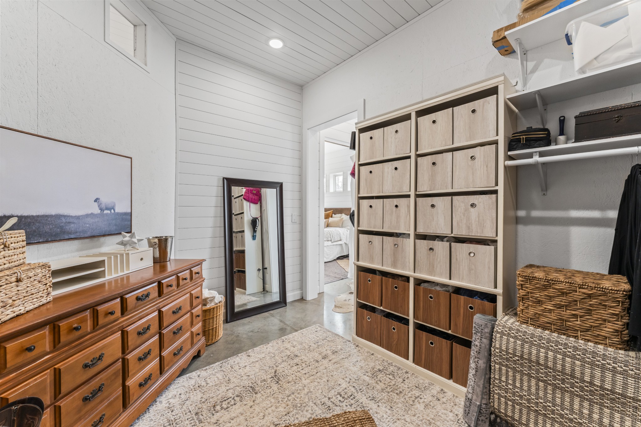 105 Mc Kinney Road Gordonsville, TN 38563 - Photo 37 of 91 a bedroom with furniture and a book shelf