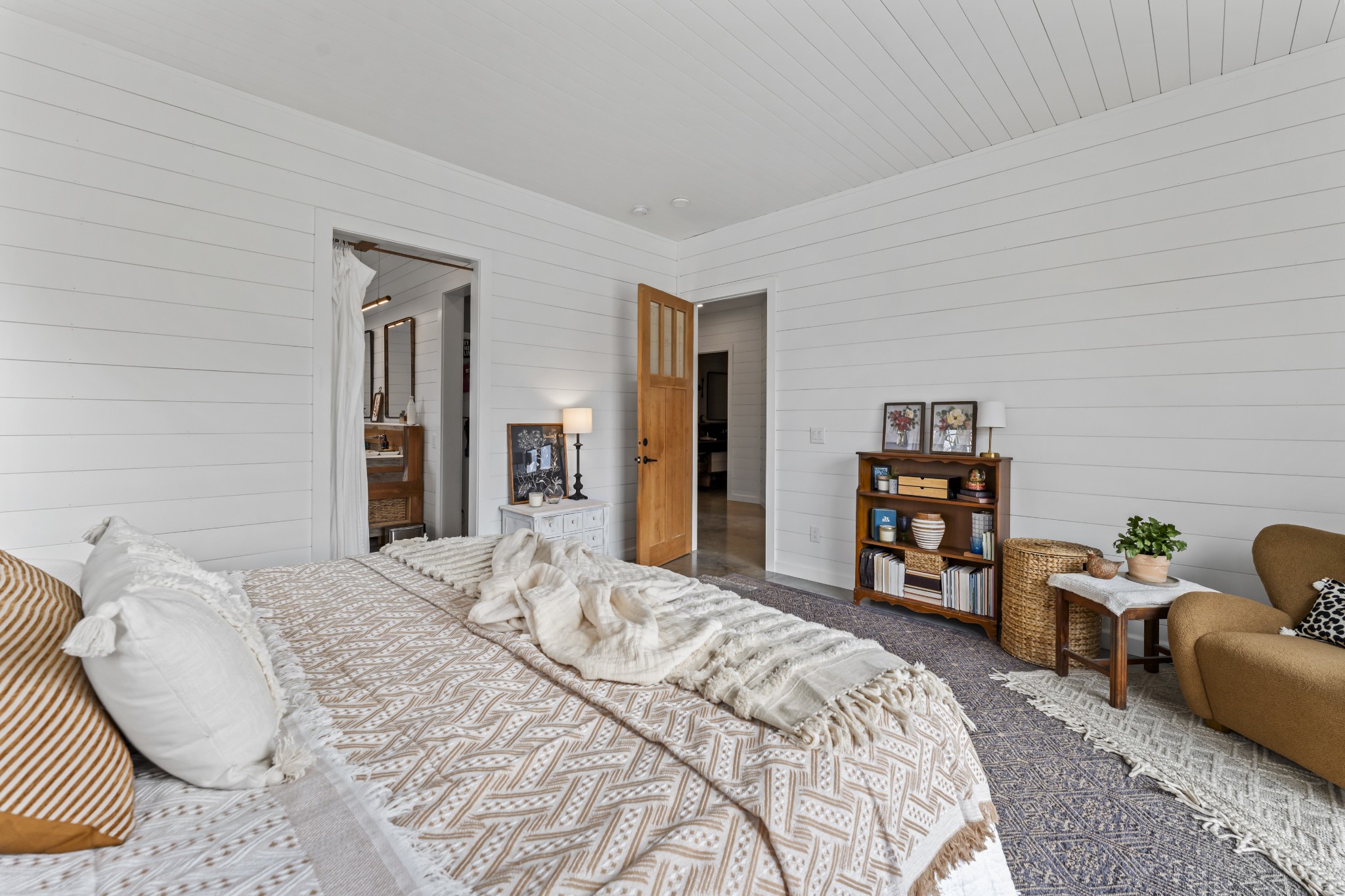 105 Mc Kinney Road Gordonsville, TN 38563 - Photo 38 of 91 a bedroom with a bed a couch and dresser