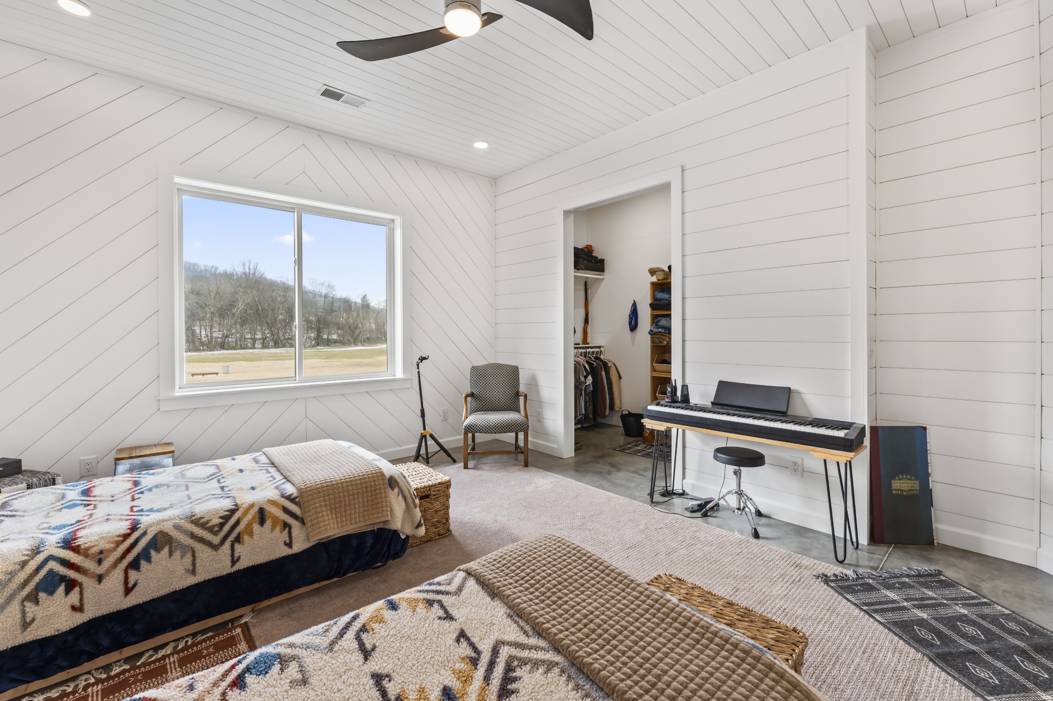 105 Mc Kinney Road Gordonsville, TN 38563 - Photo 40 of 91 a bedroom with a bed a table and a dresser