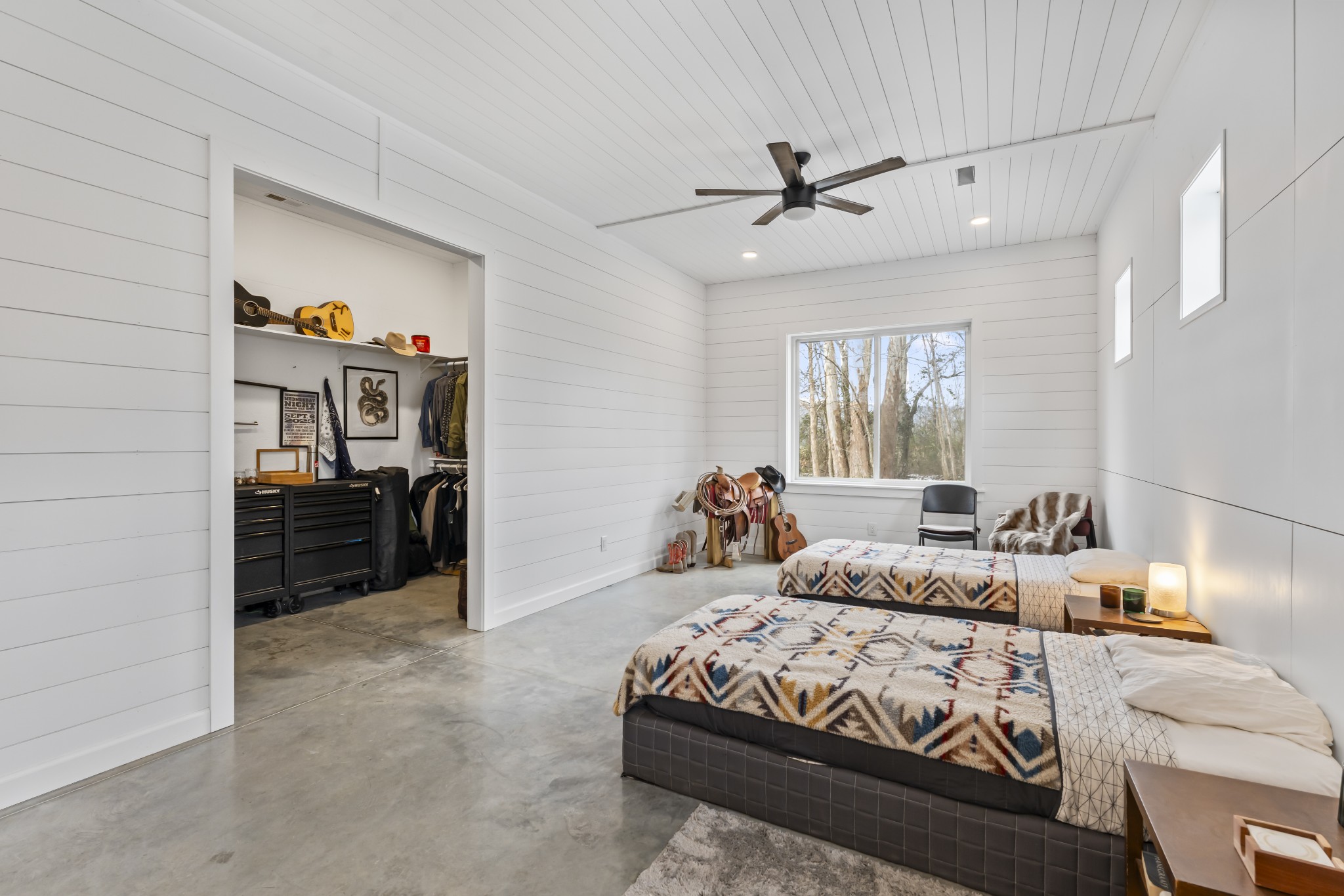 105 Mc Kinney Road Gordonsville, TN 38563 - Photo 48 of 91 a bedroom with a bed and a walk in closet