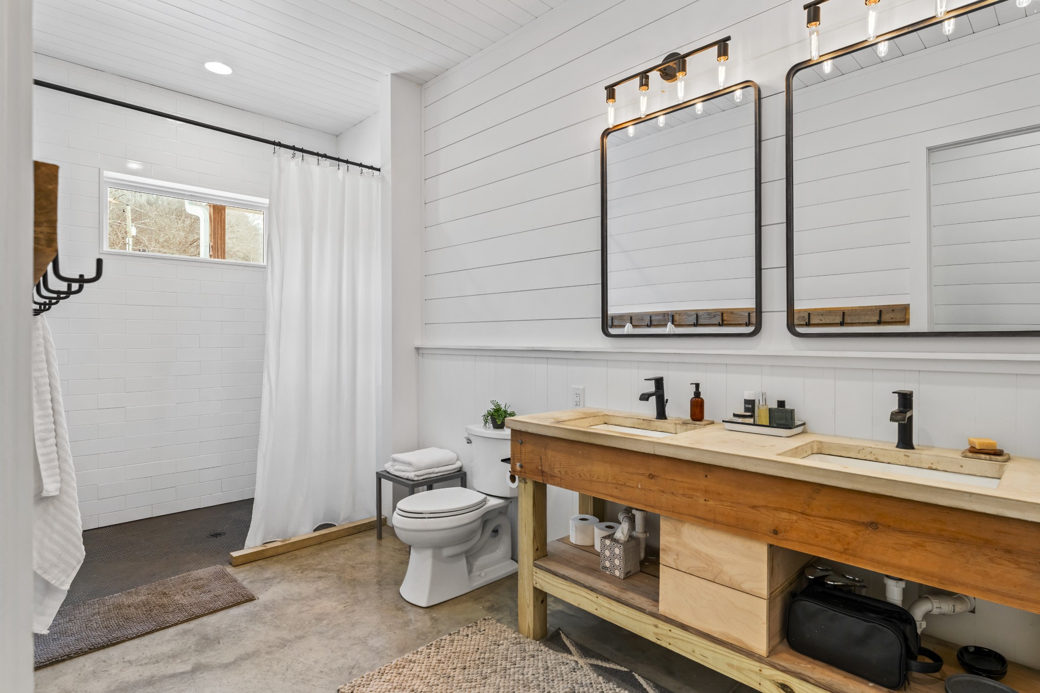 105 Mc Kinney Road Gordonsville, TN 38563 - Photo 50 of 91 a bathroom with double sink and a mirror