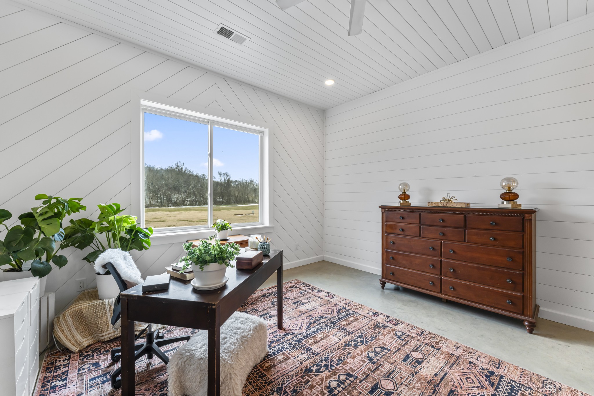 105 Mc Kinney Road Gordonsville, TN 38563 - Photo 53 of 91 a living room with furniture and a potted plant
